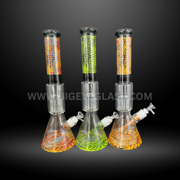16-inch beaker glass water pipes with colorful swirl patterns and built-in percolators. Durable wholesale bongs for smoke shops, head shops, and distributors.
