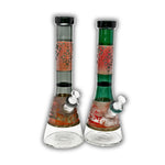 Tall beaker-style glass bong with metallic geometric sandblasted artwork, colored neck accents, and clear glass chamber.