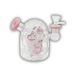 Compact glass dab rig featuring an enclosed character skull perc inside a frosted dome chamber with colorful side mouthpiece accents.