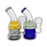 Compact glass dab rig with double ring neck design and colored base in blue and yellow variations.