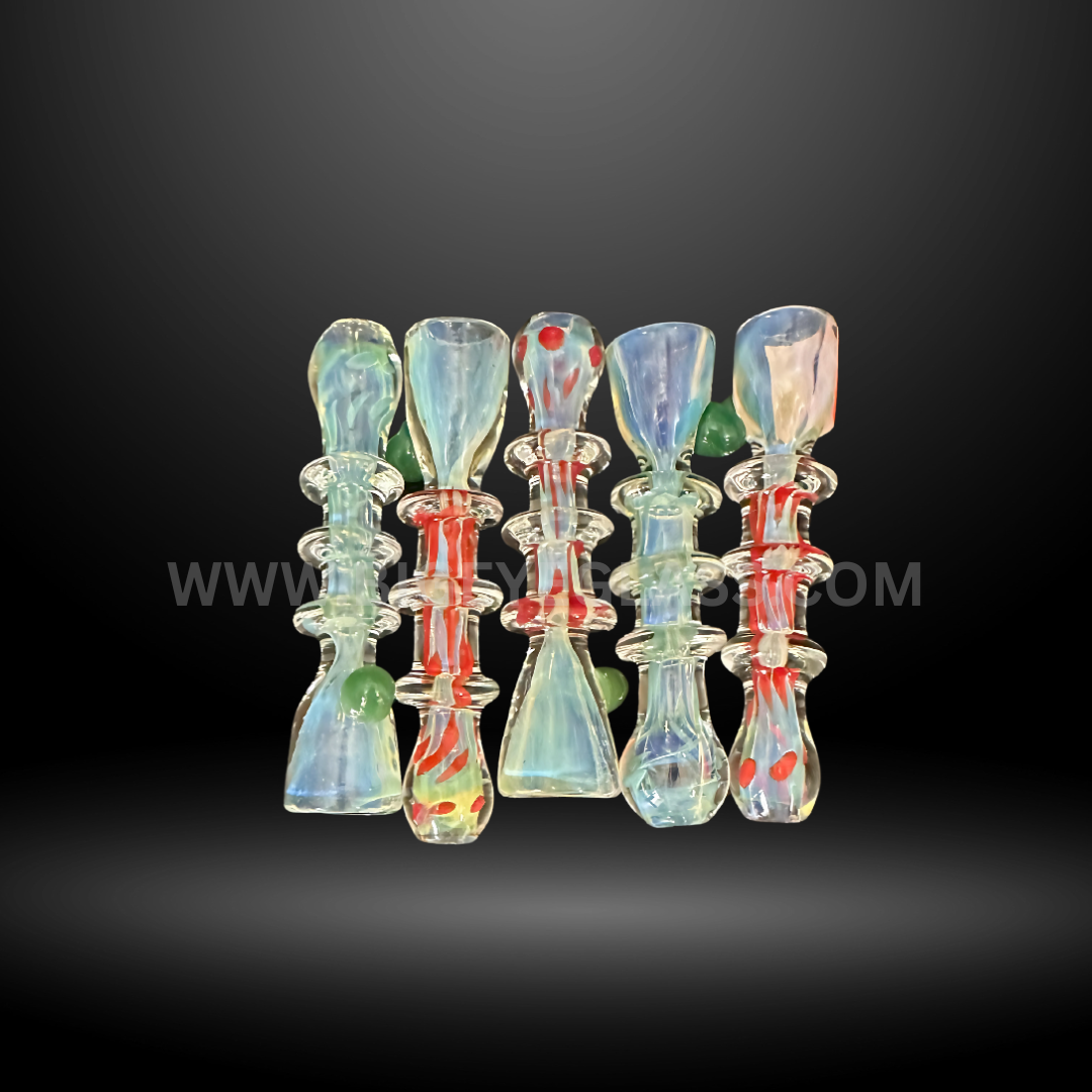 Set of 5-inch glass chillum smoking pipes with assorted colors, striped patterns, and marble accents. Wholesale hand pipes for smoke shops and head shops.