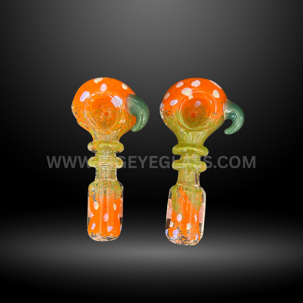 Set of 5-inch orange glass hand pipes with white polka dots and green side accents. Durable wholesale smoking pipes for smoke shops and head shops.