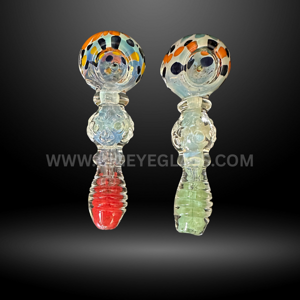 Assorted 5-inch spotted glass hand pipes with colorful bowls and ribbed textured handles. Wholesale glass pipes for smoke shops and distributors.