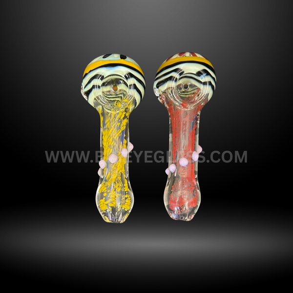 Assorted 5-inch glass hand pipes featuring bold striped bowl designs, colorful frit patterns, and marble accents. Wholesale pipes for smoke shops and head shops.