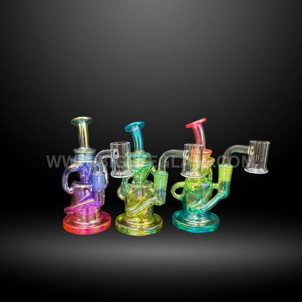 Set of three colorful recycler dab rigs with quartz bangers. Durable wholesale glass oil rigs for concentrates, designed for smoke shops and distributors.