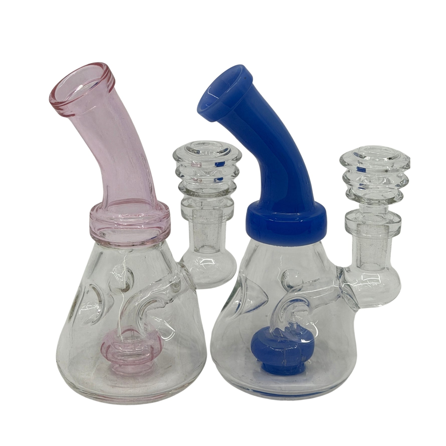 Small glass dab rig with beaker-style base, curved neck, and colored accents in pink and blue variations.