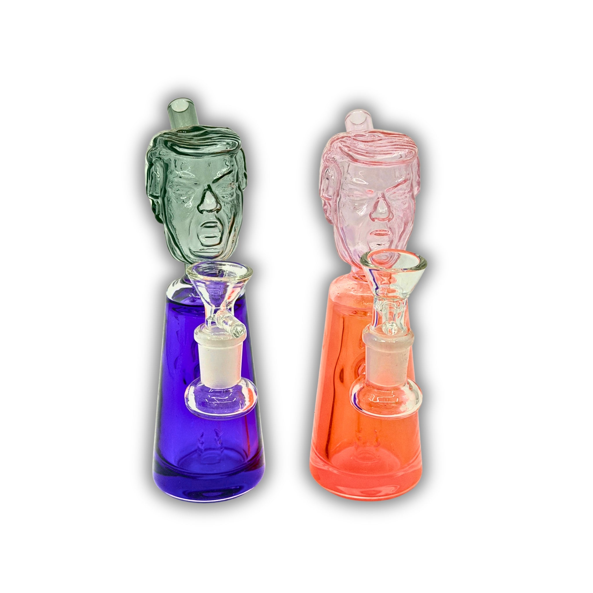 Glass water pipe featuring a sculpted face head design with a colored base and compact body.