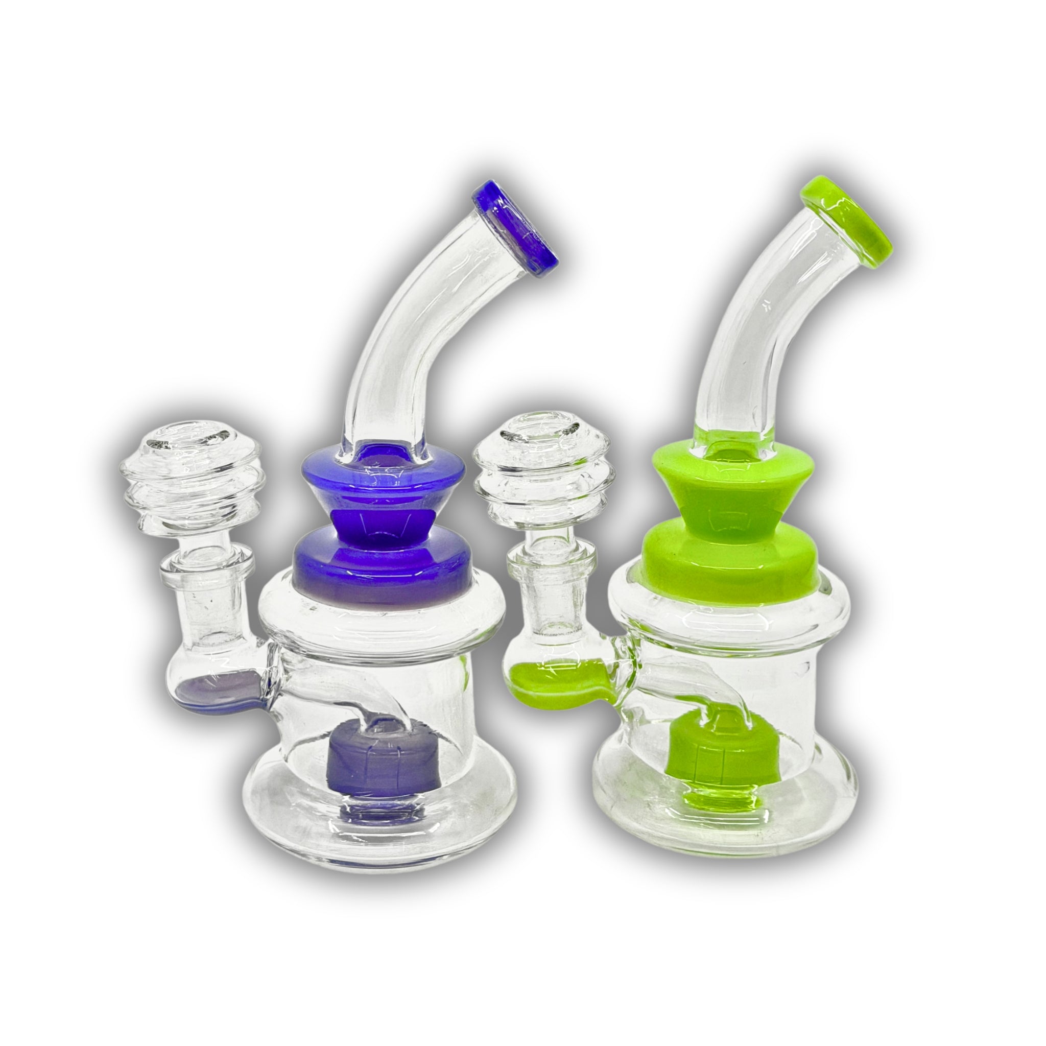 Compact glass dab rig featuring a double chamber base and colored accent neck in purple and green variations.