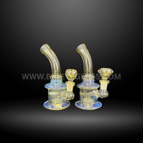 Pair of 6 inch golden fumed glass water bongs with bent neck design and round base. Durable wholesale smoking accessories for head shops and distributors.