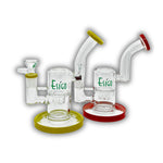 Compact ESIGO branded glass dab rig with showerhead percolator, angled mouthpiece, and colored base and rim accents.