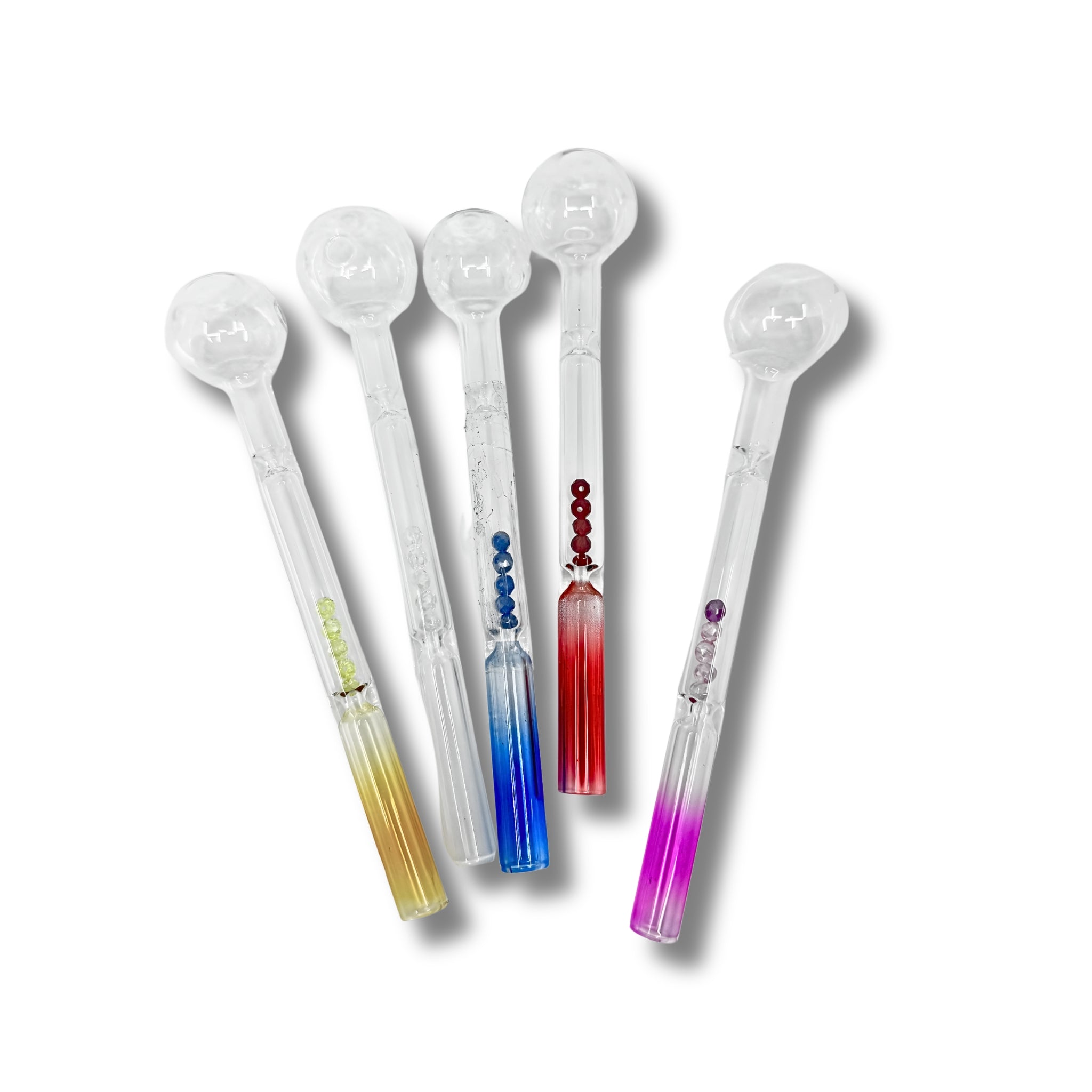 Clear glass oil burner pipes with colored bead accents inside the stem in blue, green, and red designs.