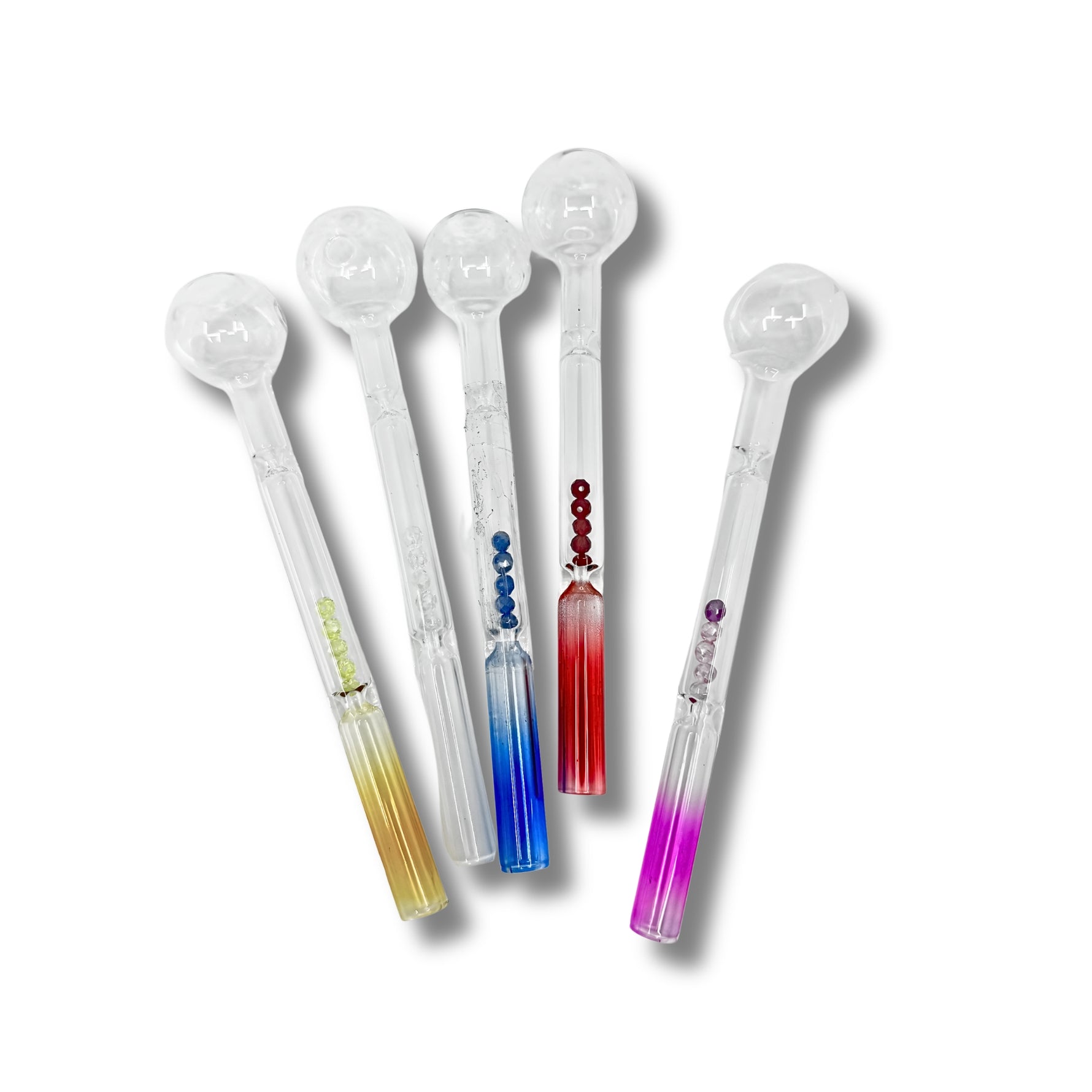 Clear glass oil burner pipes with colored bead accents inside the stem in blue, green, and red designs.
