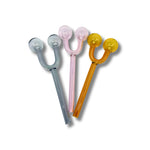 U-shaped glass oil burner pipe with double bubble ends in pink, amber, and gray transparent colors.