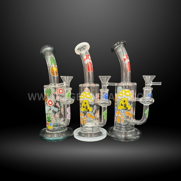 Set of three colorful glass bongs with mushroom and pineapple artwork. Durable wholesale water pipes designed for smoke shops and head shop distributors.