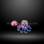 Shiny octopus-shaped metal herb grinder in blue color displayed with retail packaging. Durable 4-piece design for smooth grinding.