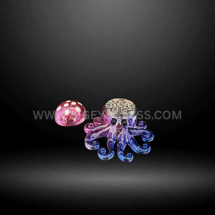 Shiny octopus-shaped metal herb grinder in blue color displayed with retail packaging. Durable 4-piece design for smooth grinding.