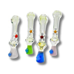 Clear glass chillum pipes with colorful base and white daisy flower accents in assorted designs.