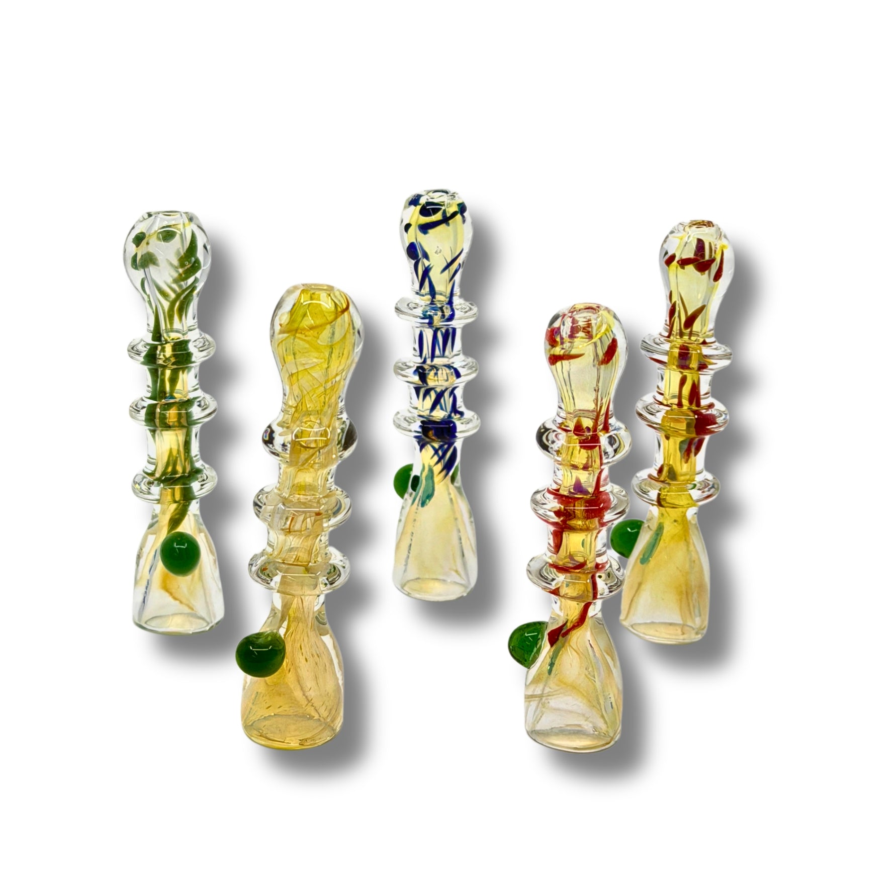 Fumed glass chillum pipes with ring grip design and colorful accents in green, blue, and red.