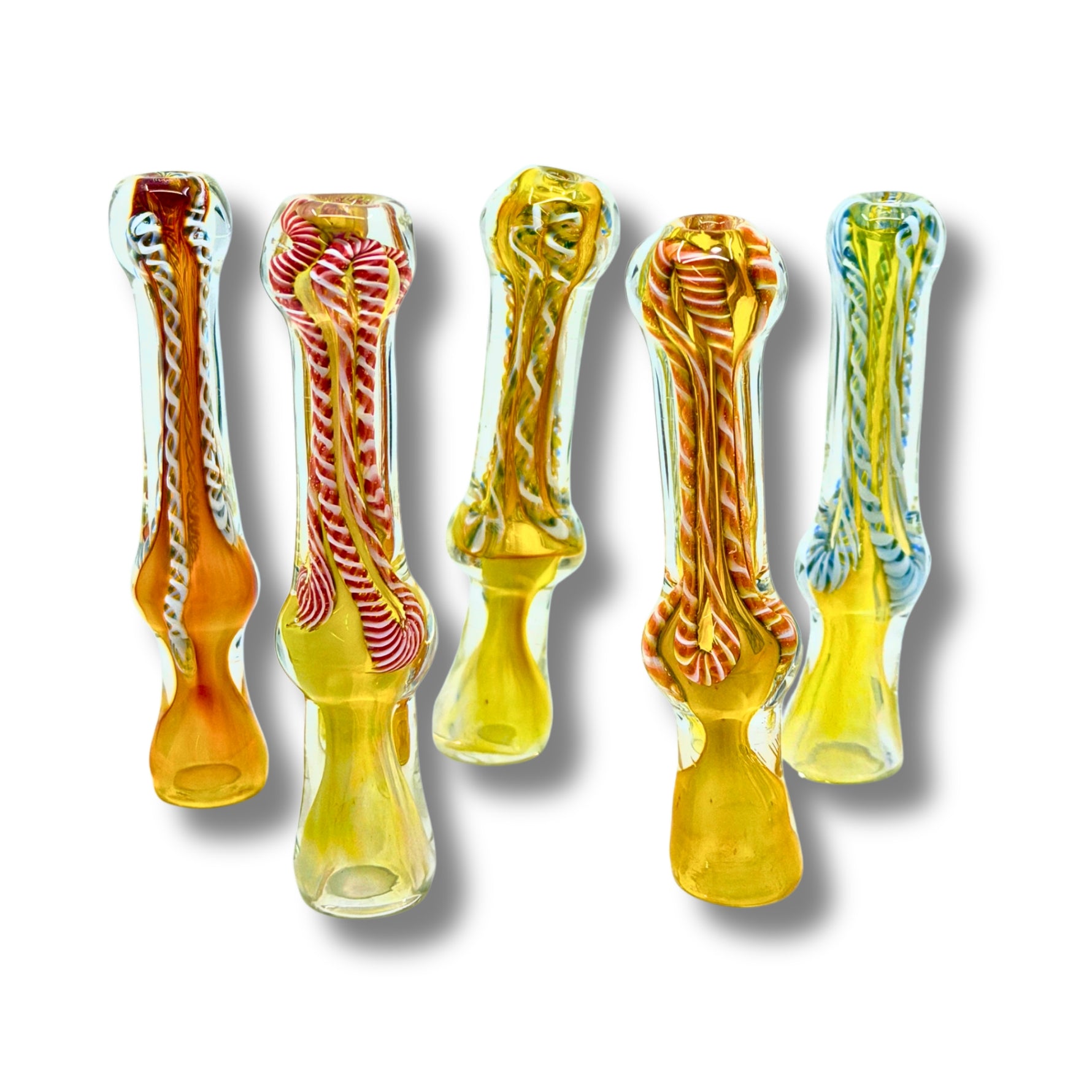 Hand-blown glass chillum pipes with fumed yellow base and colorful swirl patterns inside.