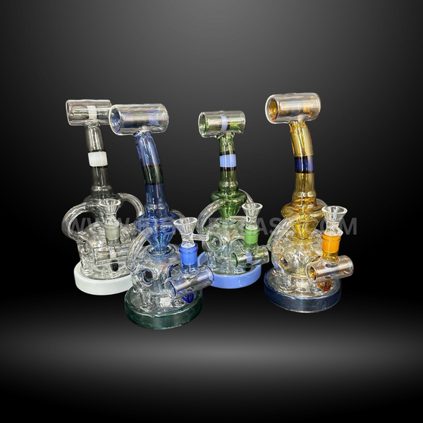 Set of four multi-color recycler glass rigs with intricate percolator design. Wholesale dab rigs and water pipes for smoke shops and head shop distributors.