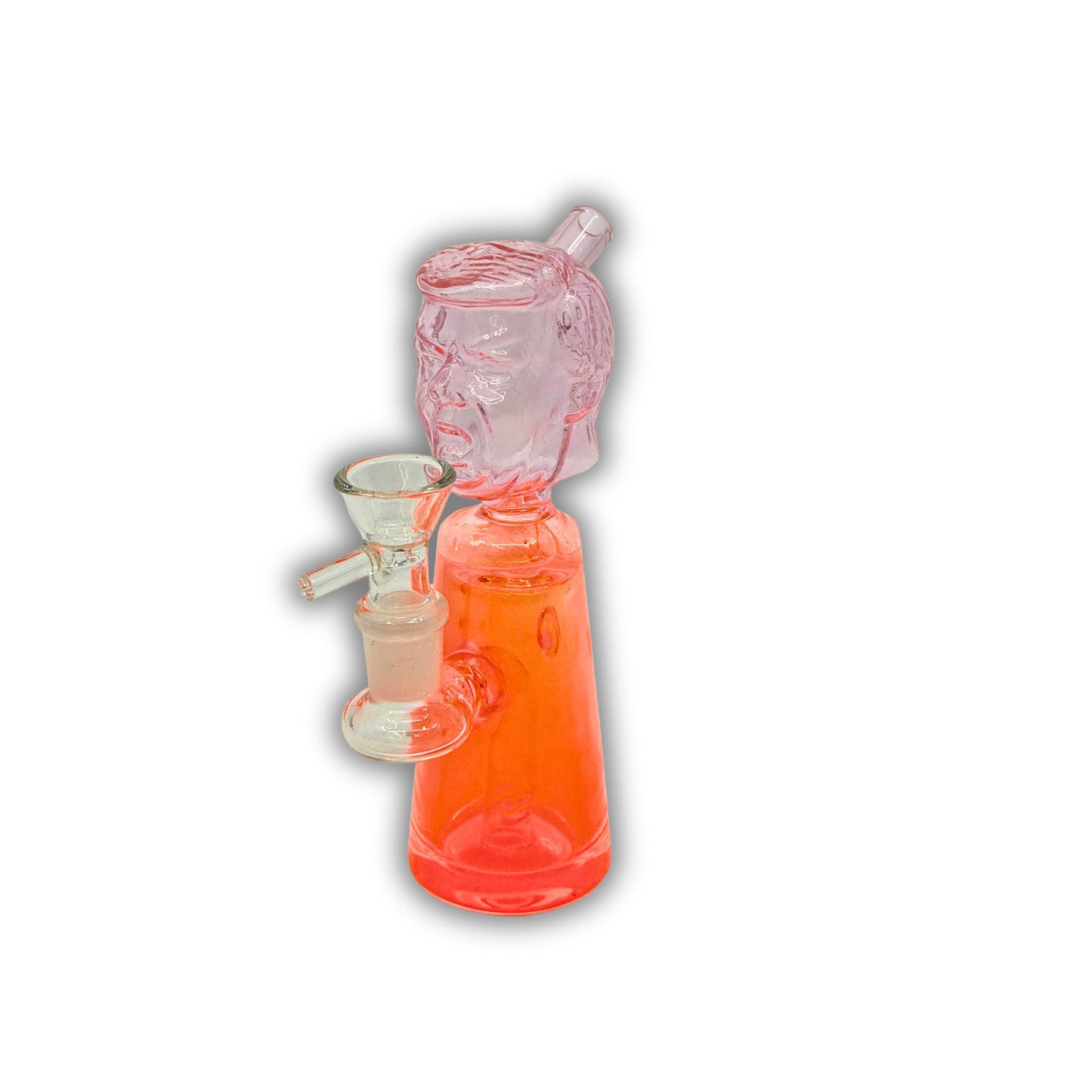 Glass water pipe featuring a sculpted face head design with a colored base and compact body.