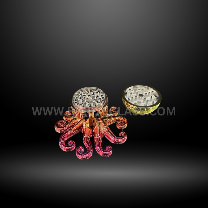 Shiny octopus-shaped metal herb grinder in orange color displayed with retail packaging. Durable 4-piece design for smooth grinding.