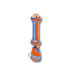 Glass chillum pipes with striped swirl patterns in multiple colors including red, blue, green, white, and yellow.
