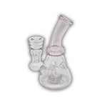 Small glass dab rig with beaker-style base, curved neck, and colored accents in pink and blue variations.