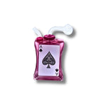 Glass oil burner  designed like playing cards with spade symbols in black, green, amber, and pink colors.