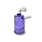 Cylinder-shaped glass dab rigs with side arm and clear top in multiple colors including black, blue, red, yellow, purple, green, and pink.