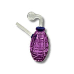 Grenade-shaped glass oil burner pipes in green, red, blue, purple, and amber colors with textured body design.