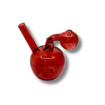 Colorful glass oil burner pipes shaped like apples in blue, purple, red, and green with round body and leaf detail.
