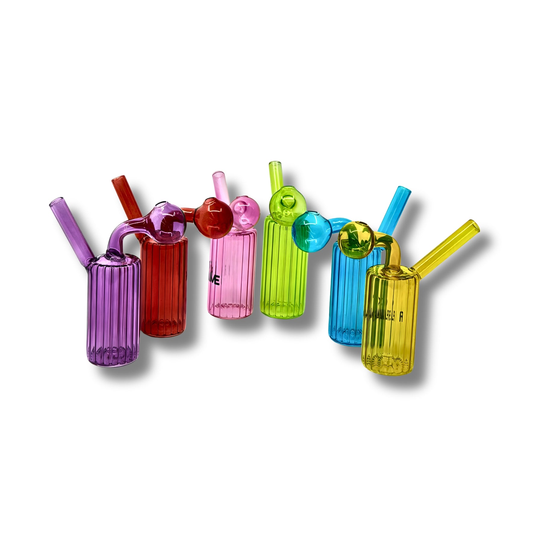 Ribbed cylindrical glass oil burner pipes with side bubble chamber in multiple transparent colors including purple, red, pink, green, blue, and yellow.