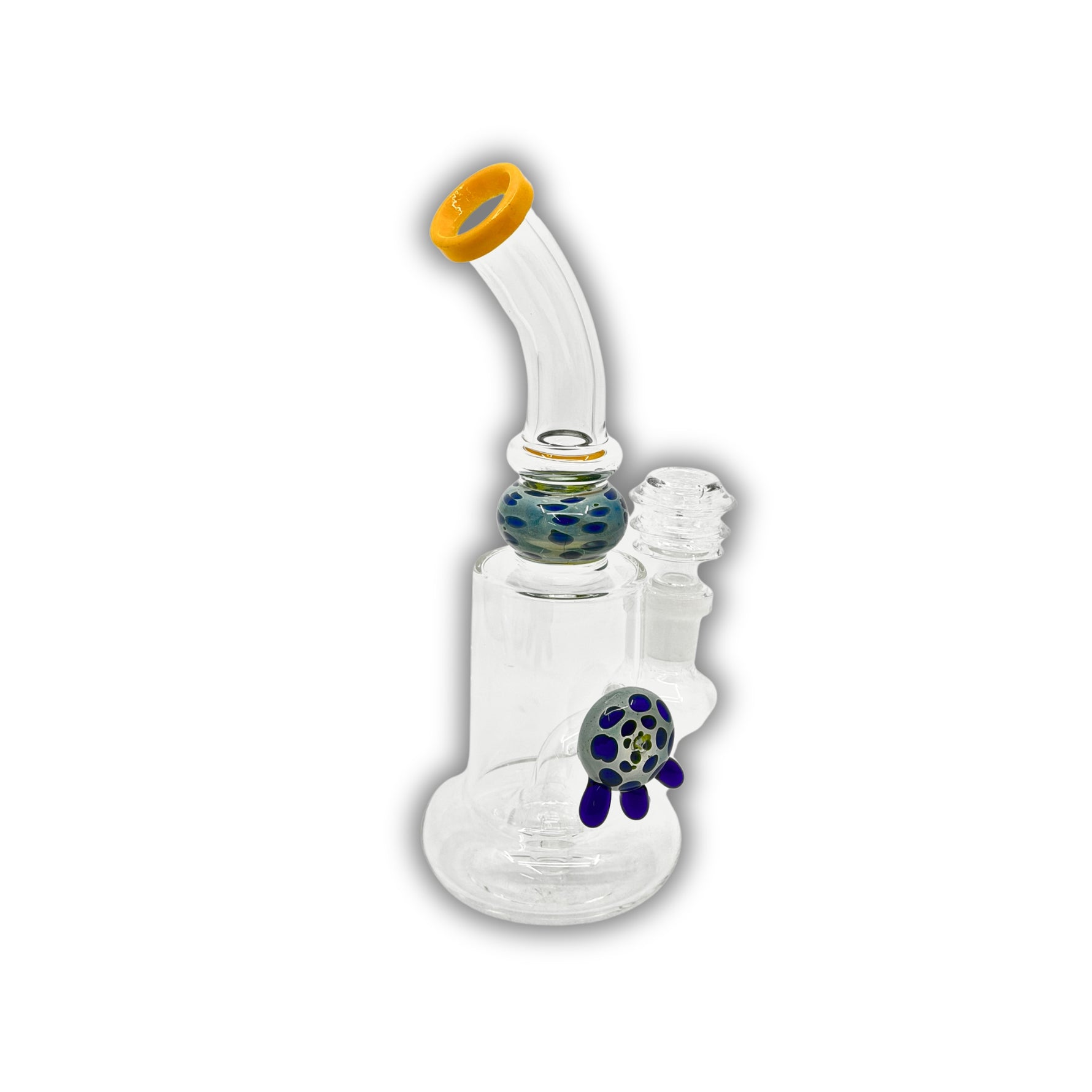 Compact glass dab rig featuring a bubble chamber with decorative turtle accent and spotted glass marble detail, available with colored mouthpieces.